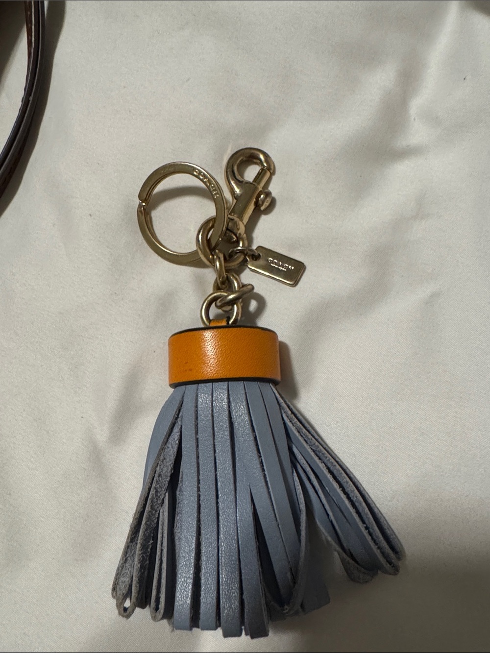 Coach Leather Tassel Key Charm in Blue and Orange with Gold Hardware